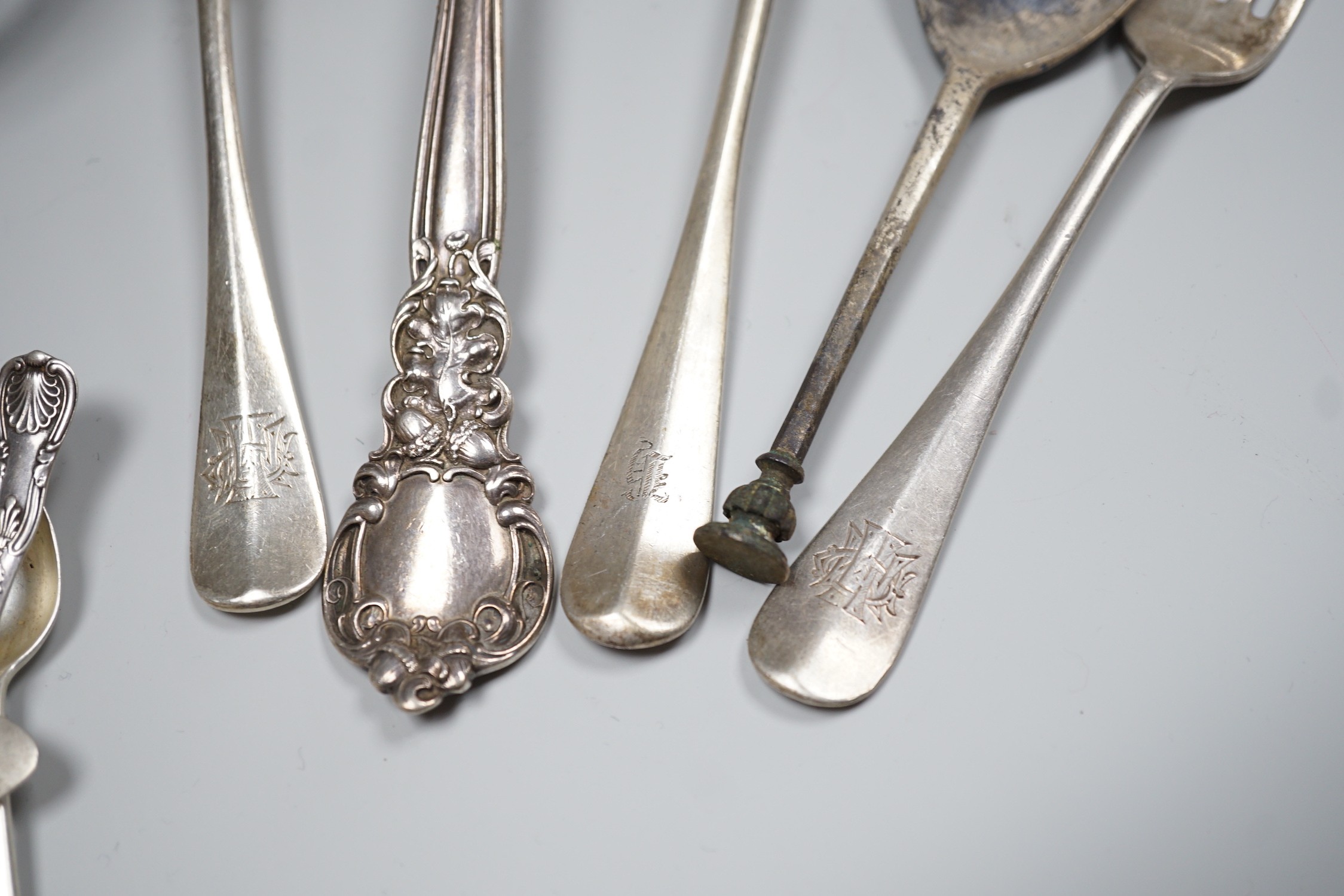 Sundry small silver including a 1930's cream jug, a Victorian mustard pot (no liner), two napkin rings and a small quantity of assorted silver and sterling flatware, 20.8oz.